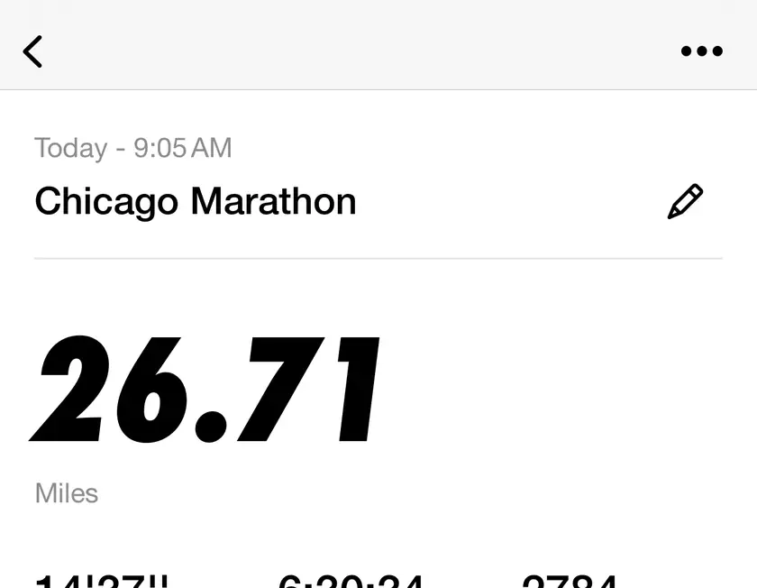 Watch activity summary showing Chicago Marathon running distance of 26.71 miles, time of 6 hours 30 minutes 34 seconds, and average pace of 14 minutes 37 seconds per mile